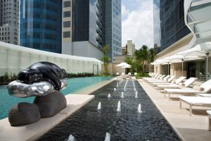 Serene poolside view of St. Regis Hotel