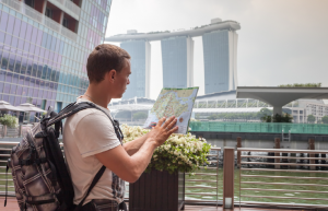 Tourist with Singapore map
