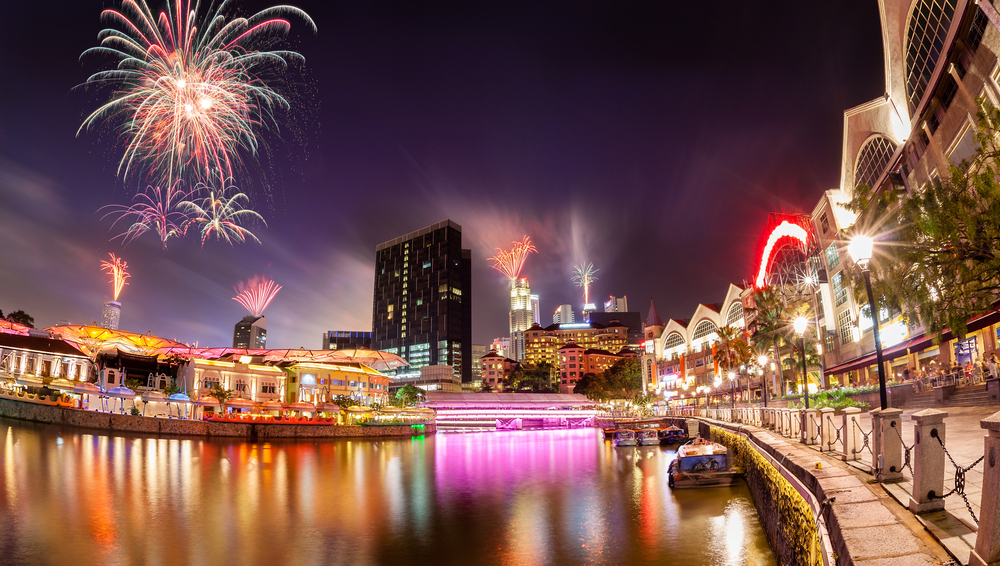 Fireworks set off in the backdrop to the Singapore River along Clarke Quay
